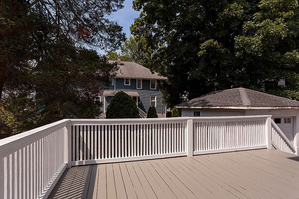 37 Huntington Road Milton, MA 02186 - Photo 8 of 35 a view of a wooden deck and a yard