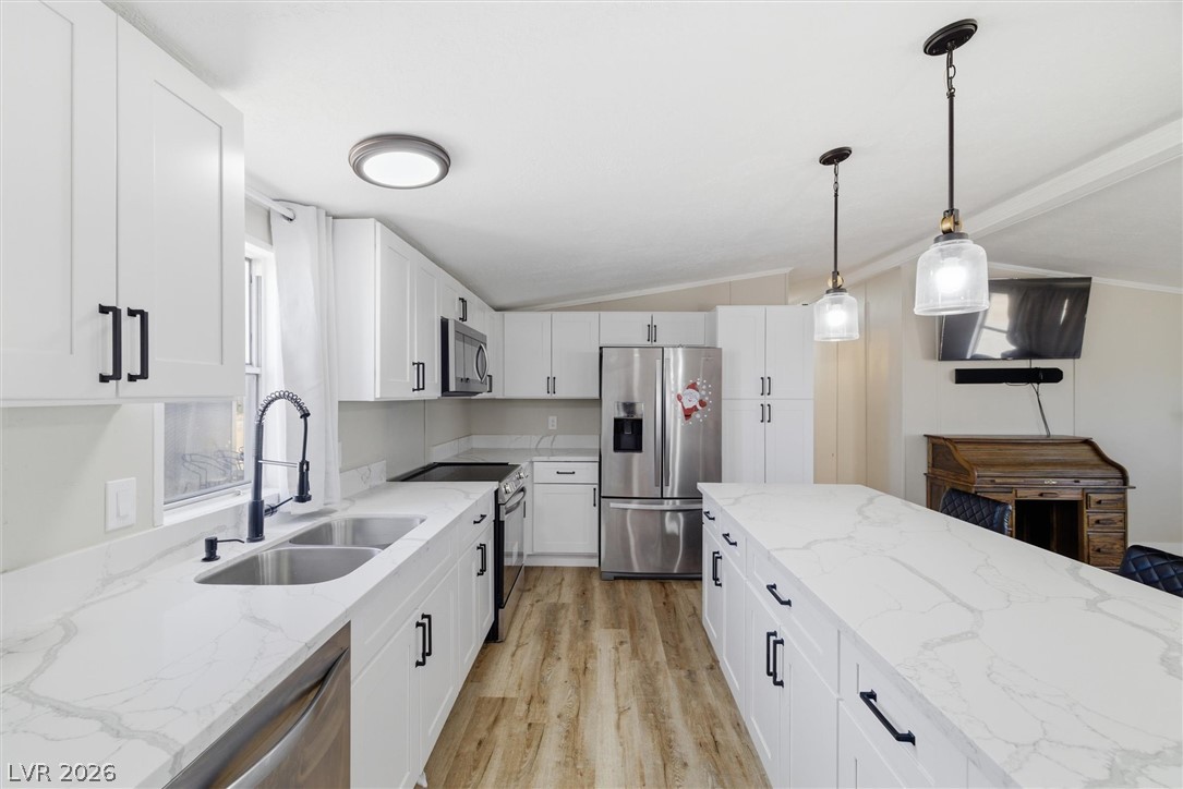 4331 Retread Road Pahrump, NV 89048 - Photo 6 of 31 Culinary aspirations come alive in this meticulously appointed kitchen, featuring abundant counter space and modern appliances.
