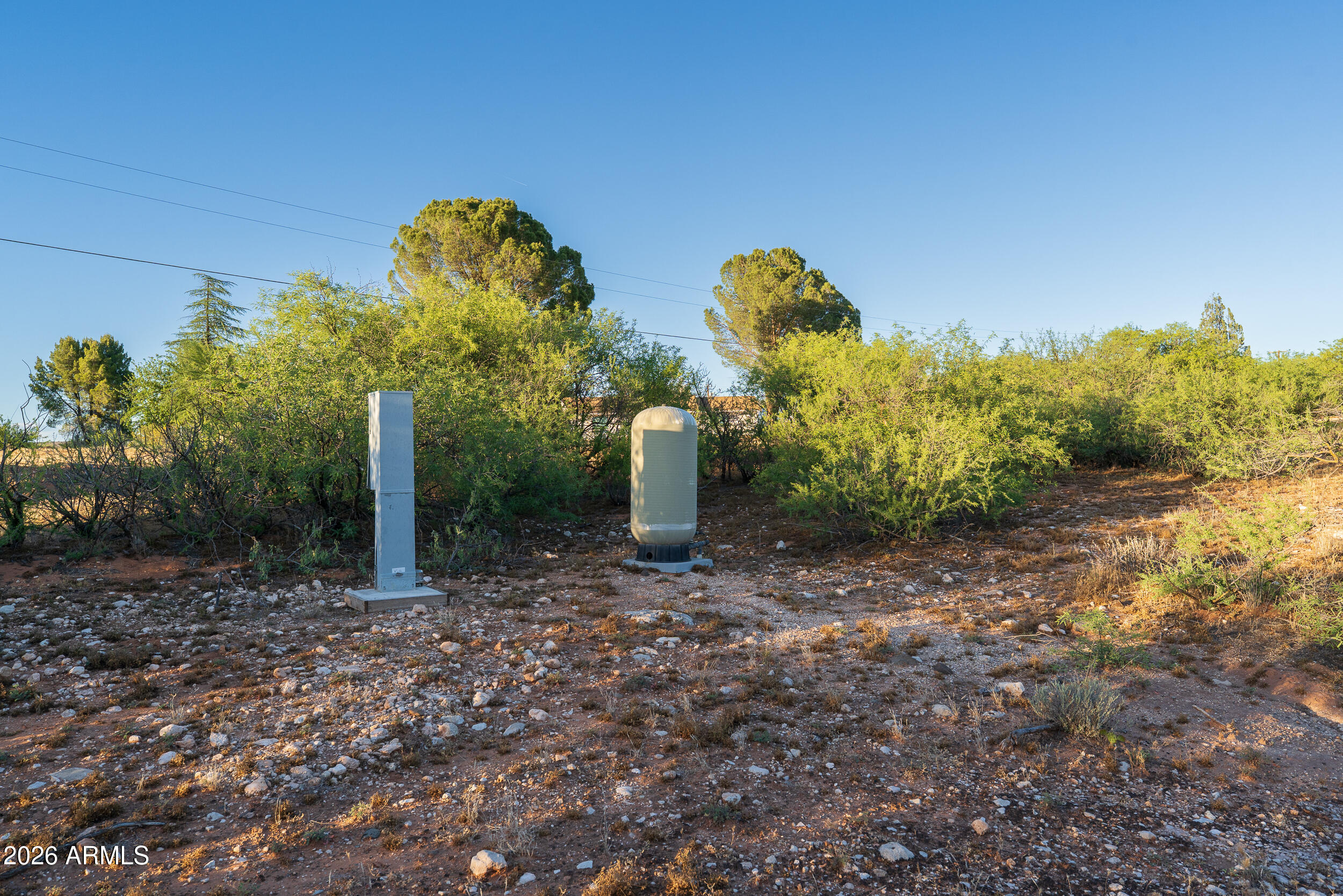 796 North Aspaas Road Cornville, AZ 86325 - Photo 21 of 25 a backyard of a house with lots of green space
