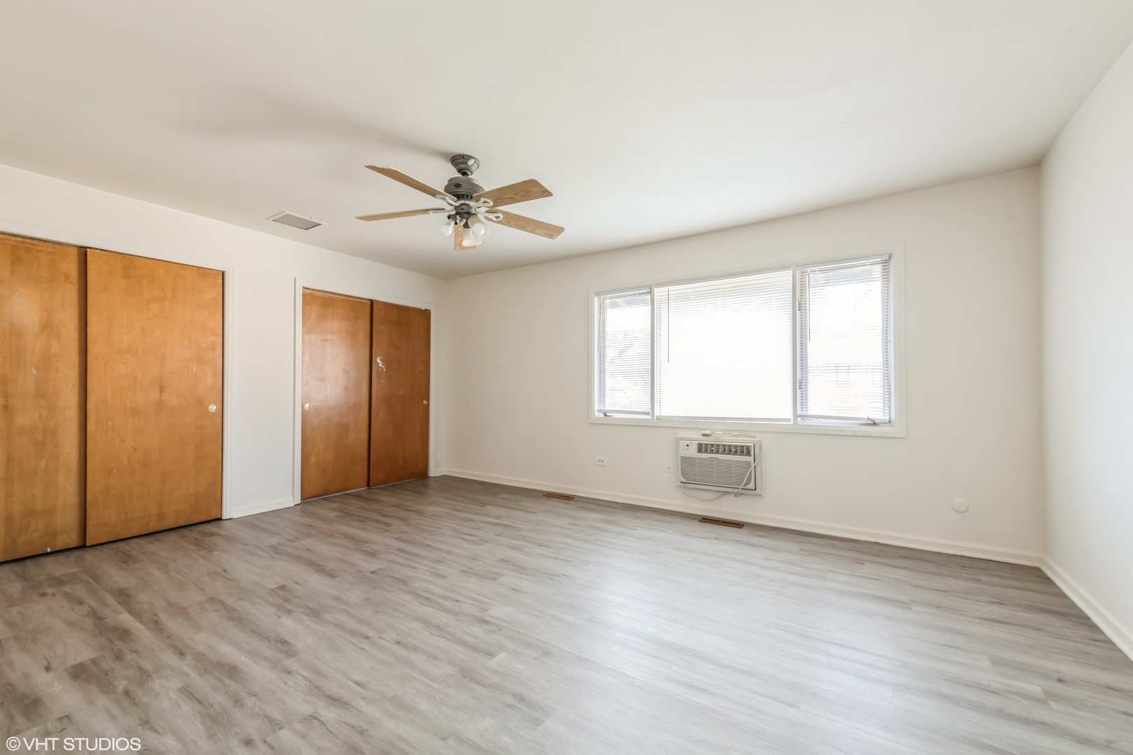 768 Concord Lane, Unit 768 Barrington, IL 60010 - Photo 8 of 12 a view of an empty room with a window