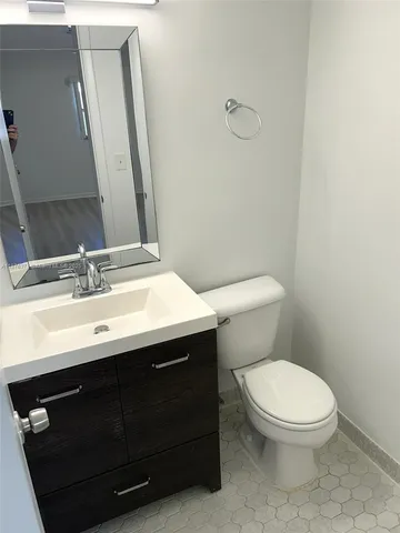 a bathroom with a sink and a toilet