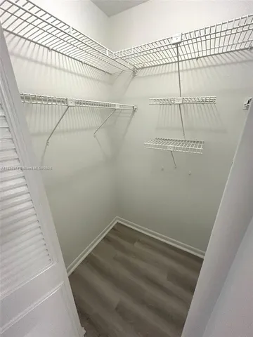 a view of a room with racks on the wall