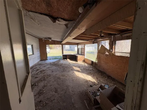 a kitchen with a stove and a refrigerator