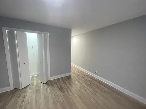 a bathroom with a shower and toilet