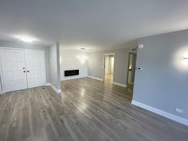 a kitchen with stainless steel appliances a refrigerator stove microwave and sink