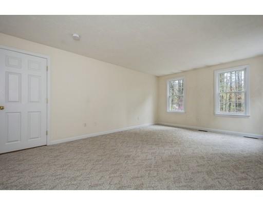 79 Rigby Road Lancaster, MA 01523 - Photo 13 of 23 a view of an empty room with a window