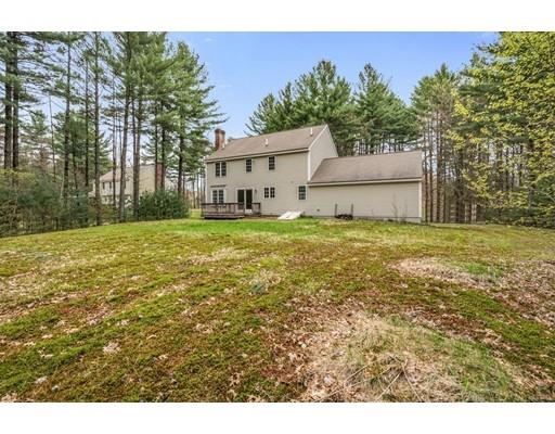 79 Rigby Road Lancaster, MA 01523 - Photo 17 of 23 a view of a house with a yard