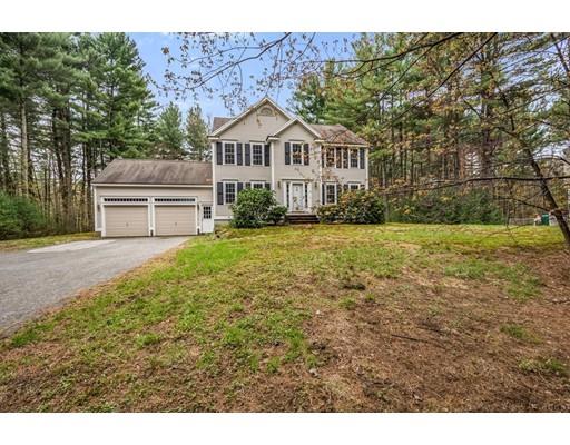 79 Rigby Road Lancaster, MA 01523 - Photo 2 of 23 a house view with a garden space