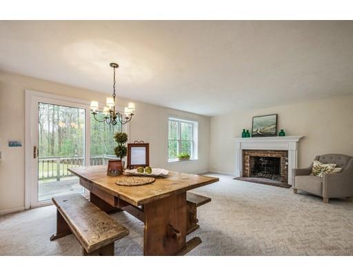 79 Rigby Road Lancaster, MA 01523 - Photo 7 of 23 a living room with furniture and a fireplace