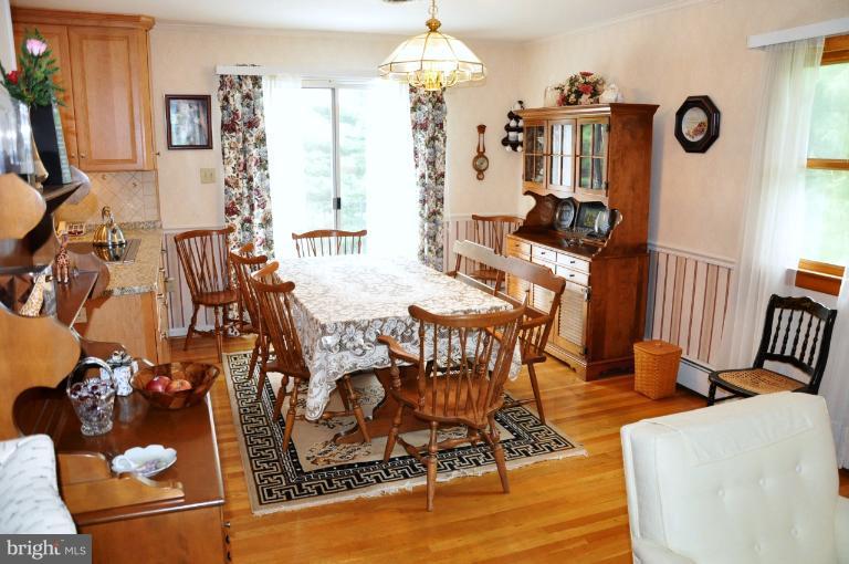 5986 Grove Hill Road Frederick, MD 21703 - Photo 14 of 30 Dining Room w/ solid oak flooring