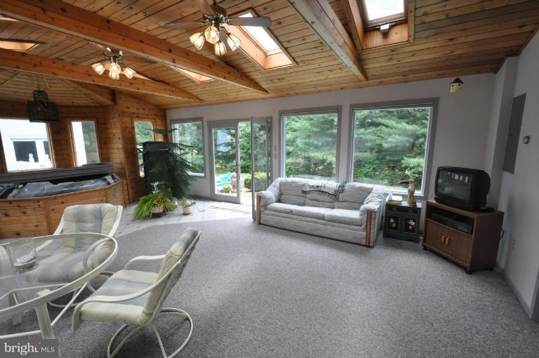 5986 Grove Hill Road Frederick, MD 21703 - Photo 27 of 30 Huge rustic room w/ lots of glass