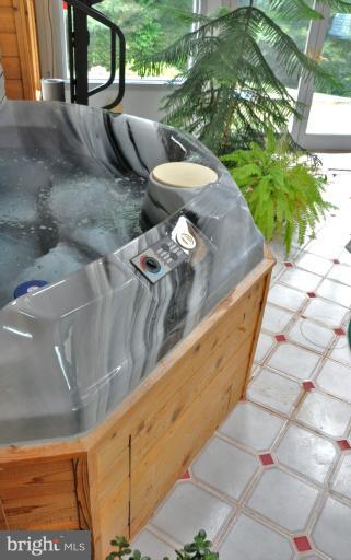 5986 Grove Hill Road Frederick, MD 21703 - Photo 28 of 30 Enjoy hot tub in rustic room w/ cathedral ceiling