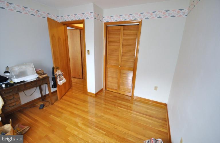 5986 Grove Hill Road Frederick, MD 21703 - Photo 6 of 30 Bedroom #3 on main level w/ wood floors