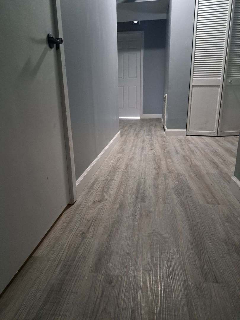 3128 North Clybourn Avenue, Unit 2R Chicago, IL 60618 - Photo 26 of 33 a view of a room with wooden floor