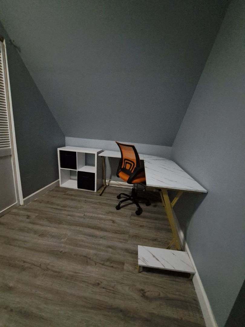 3128 North Clybourn Avenue, Unit 2R Chicago, IL 60618 - Photo 28 of 33 a view of a room with wooden floor and furniture