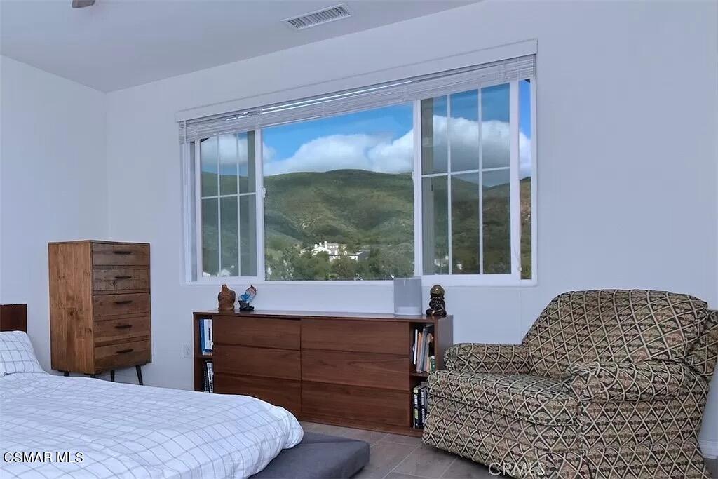 207 Morro Way, Unit 3 Simi Valley, CA 93065 - Photo 20 of 31 a living room with furniture and a window