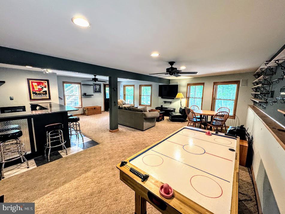 64 Algonquin Drive Hazleton, PA 18202 - Photo 17 of 64 a room with furniture a flat screen tv and a view of living room