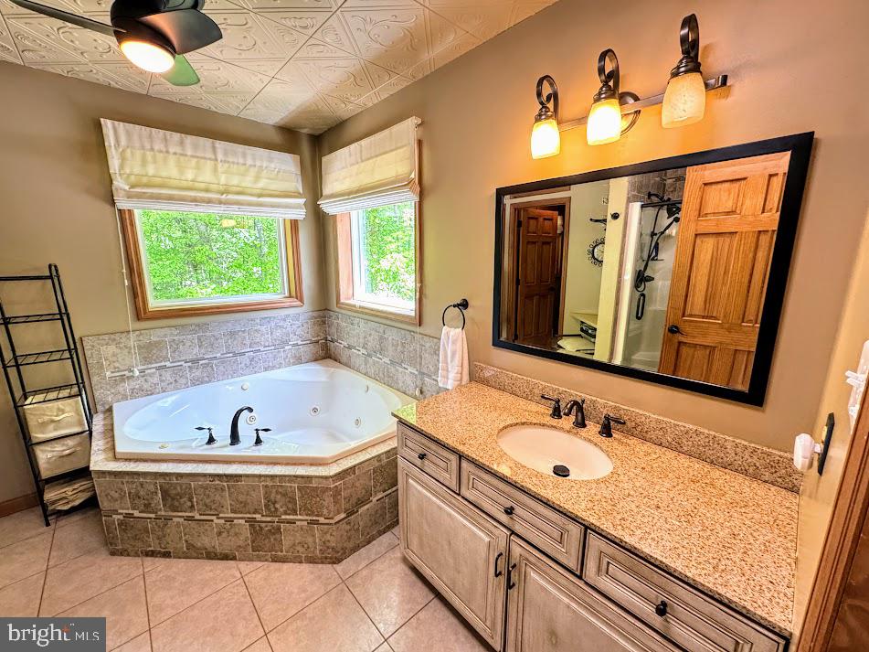 64 Algonquin Drive Hazleton, PA 18202 - Photo 26 of 64 a spacious bathroom with a tub sink and mirror