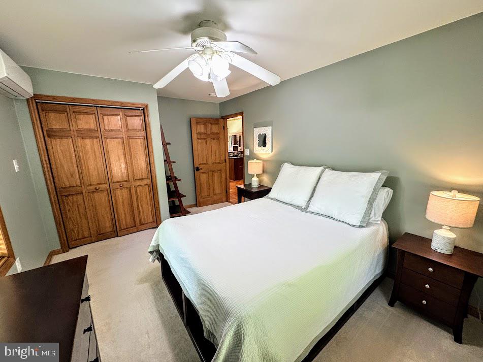 64 Algonquin Drive Hazleton, PA 18202 - Photo 31 of 64 a bedroom with a bed and a chandelier