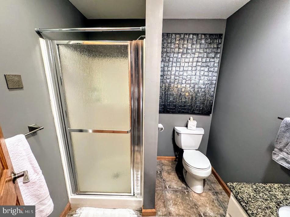 64 Algonquin Drive Hazleton, PA 18202 - Photo 35 of 64 a bathroom with a toilet and a shower