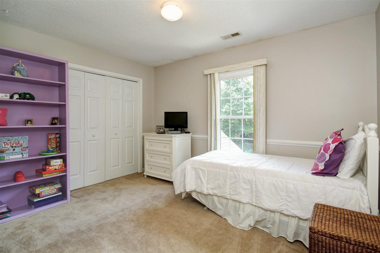 12305 Amoretto Way Raleigh, NC 27613 - Photo 23 of 30 Third bedroom is big and features great closet space again. Bedroom