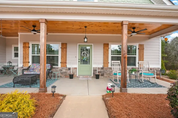 a living room filled with furniture