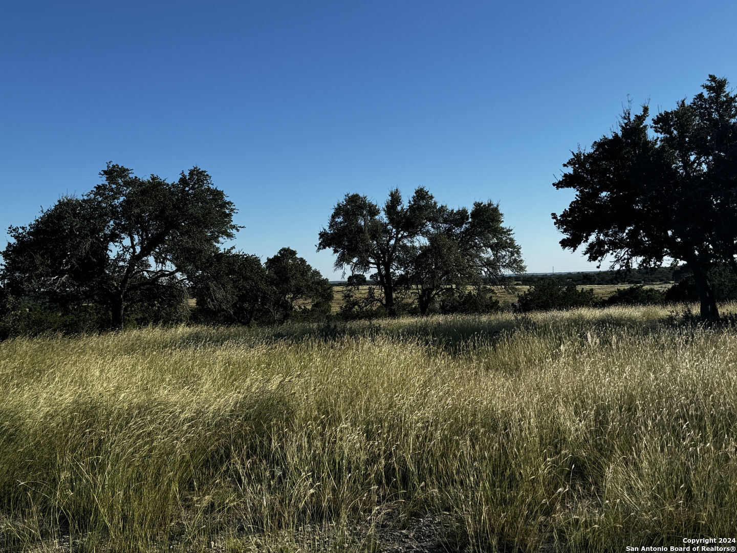 Lot 89 Loma Vista Ranch Phase 4 Kerrville, TX 78028 - Photo 2 of 9 a view of a lake with a outdoor space