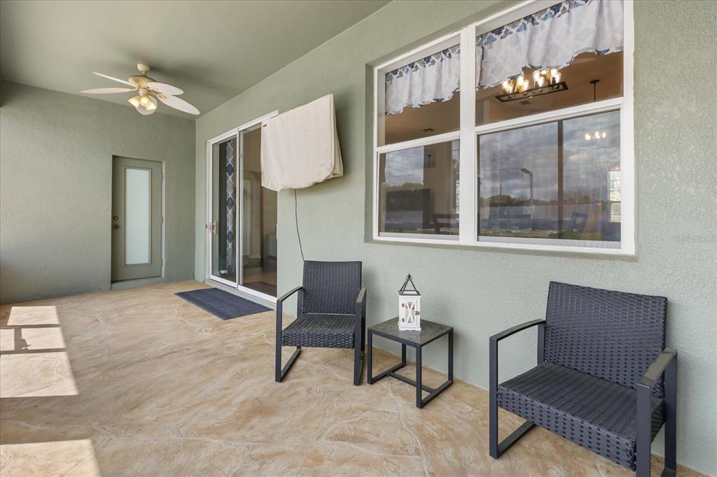 2309 Wolf Ridge Lane Mount Dora, FL 32757 - Photo 31 of 36 a view of a livingroom with furniture and windows