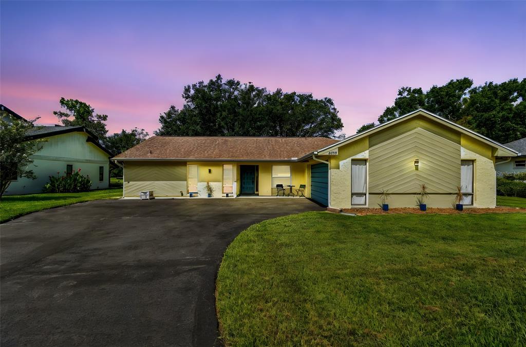 a view of a house with a big yard