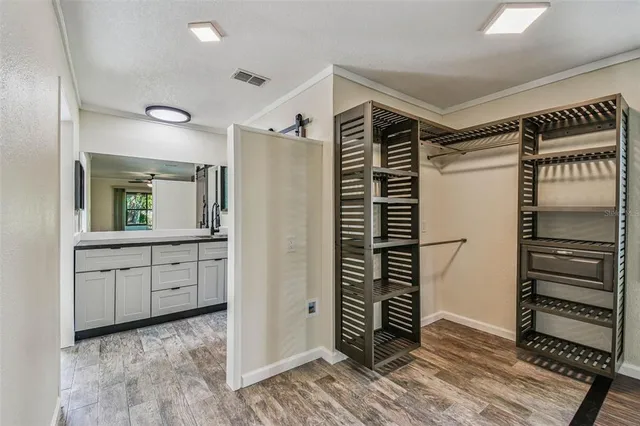 a kitchen with stainless steel appliances granite countertop a stove and a refrigerator