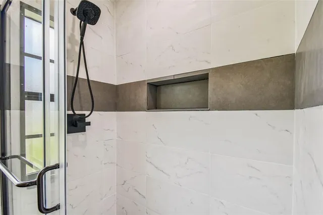 a kitchen with a sink and a refrigerator