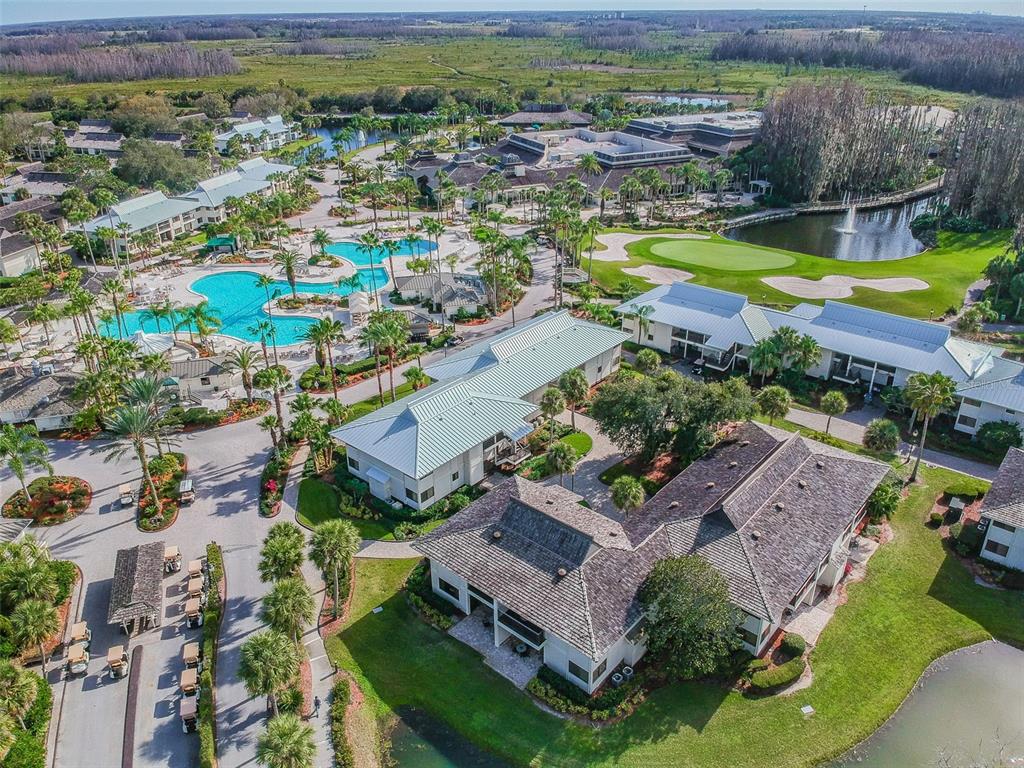 5319 Saddlebrook Way Wesley Chapel, FL 33543 - Photo 71 of 77 an aerial view of a house with a swimming pool yard and outdoor seating