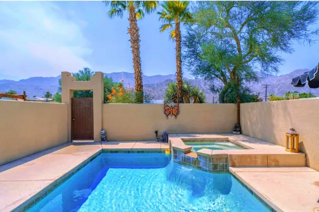swimming pool view with a outdoor space