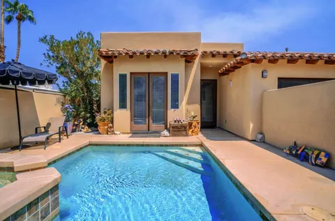 front view of a house with a patio