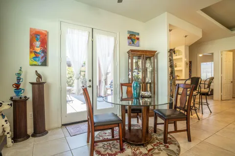 a view of a livingroom with furniture and a window