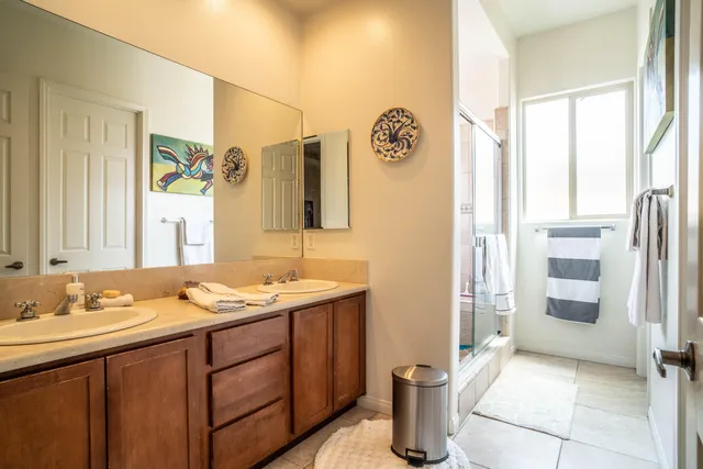 a bathroom with a bathtub and a shower