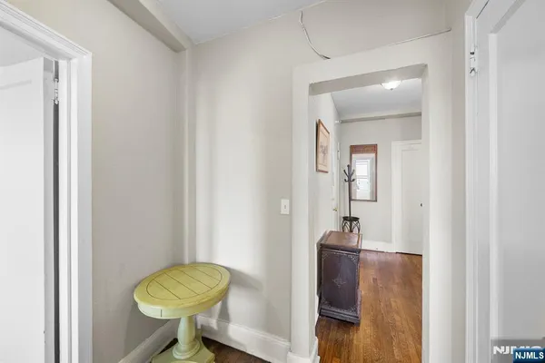 a view of a hallway with windows