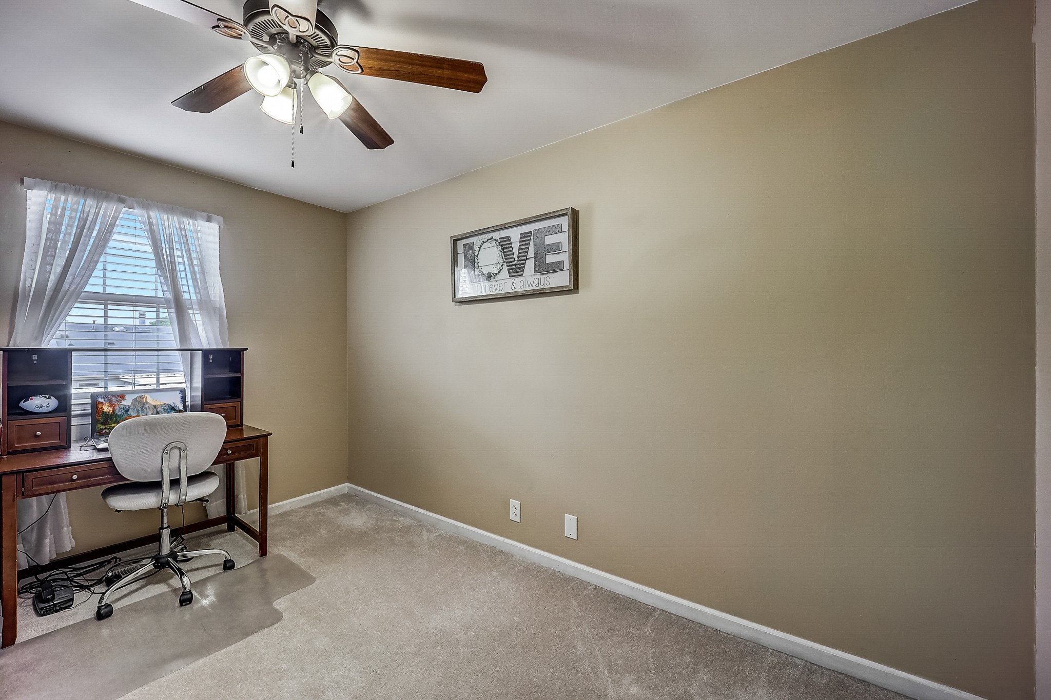 922 General George Patton Road Nashville, TN 37221 - Photo 19 of 30 a view of a workspace with furniture and a window