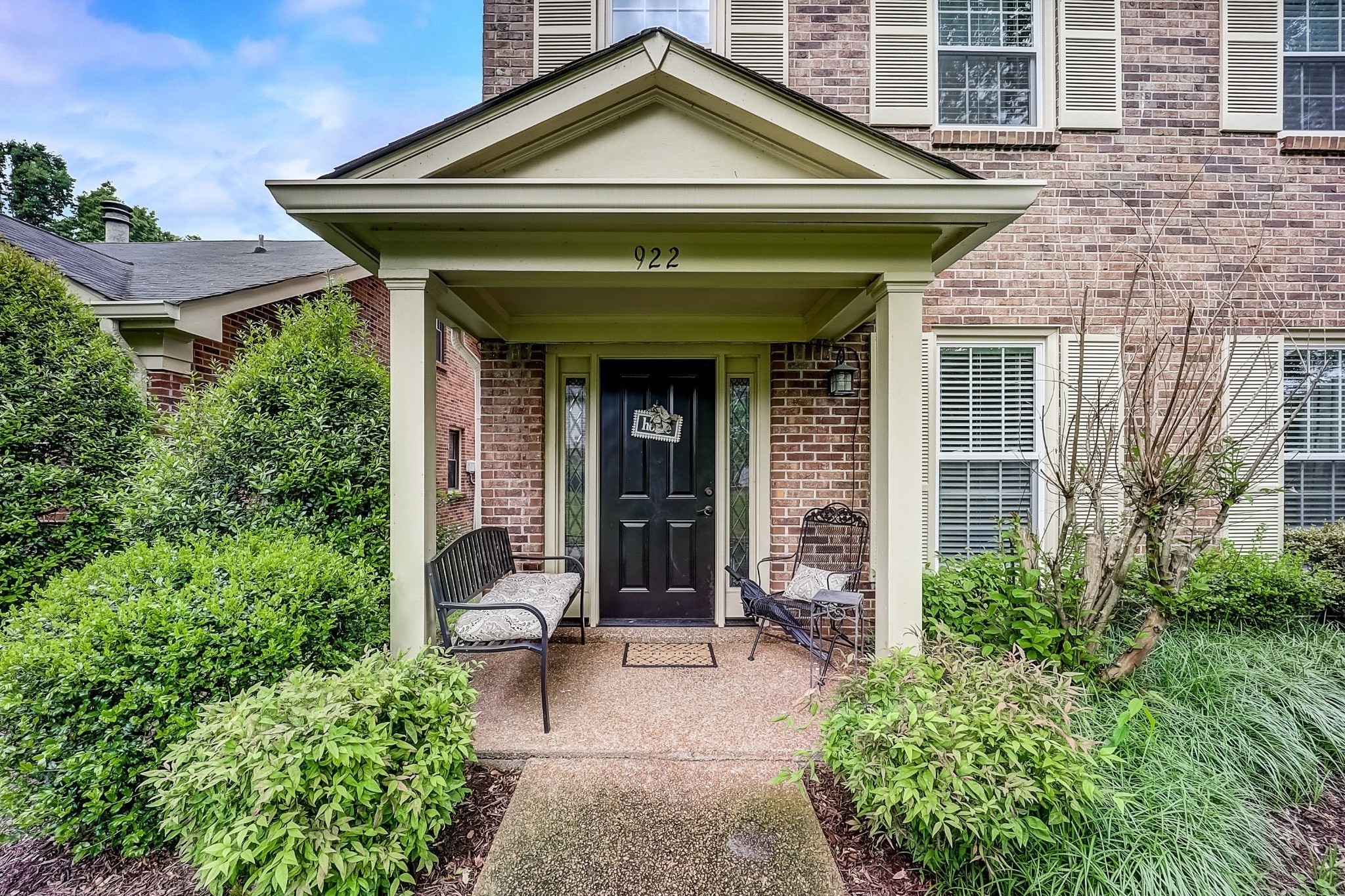 922 General George Patton Road Nashville, TN 37221 - Photo 2 of 30 a front view of a house with garden