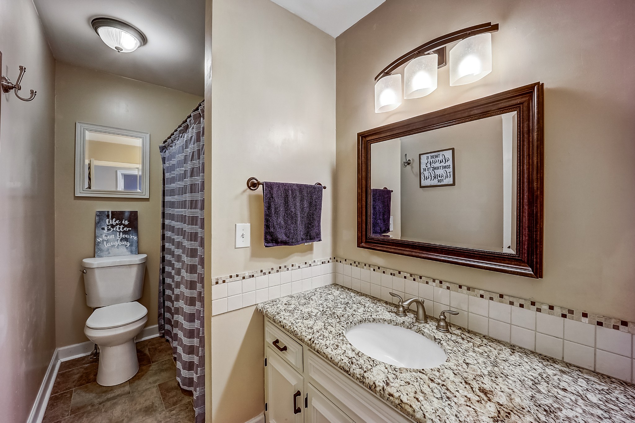 922 General George Patton Road Nashville, TN 37221 - Photo 22 of 30 a bathroom with a toilet sink and mirror