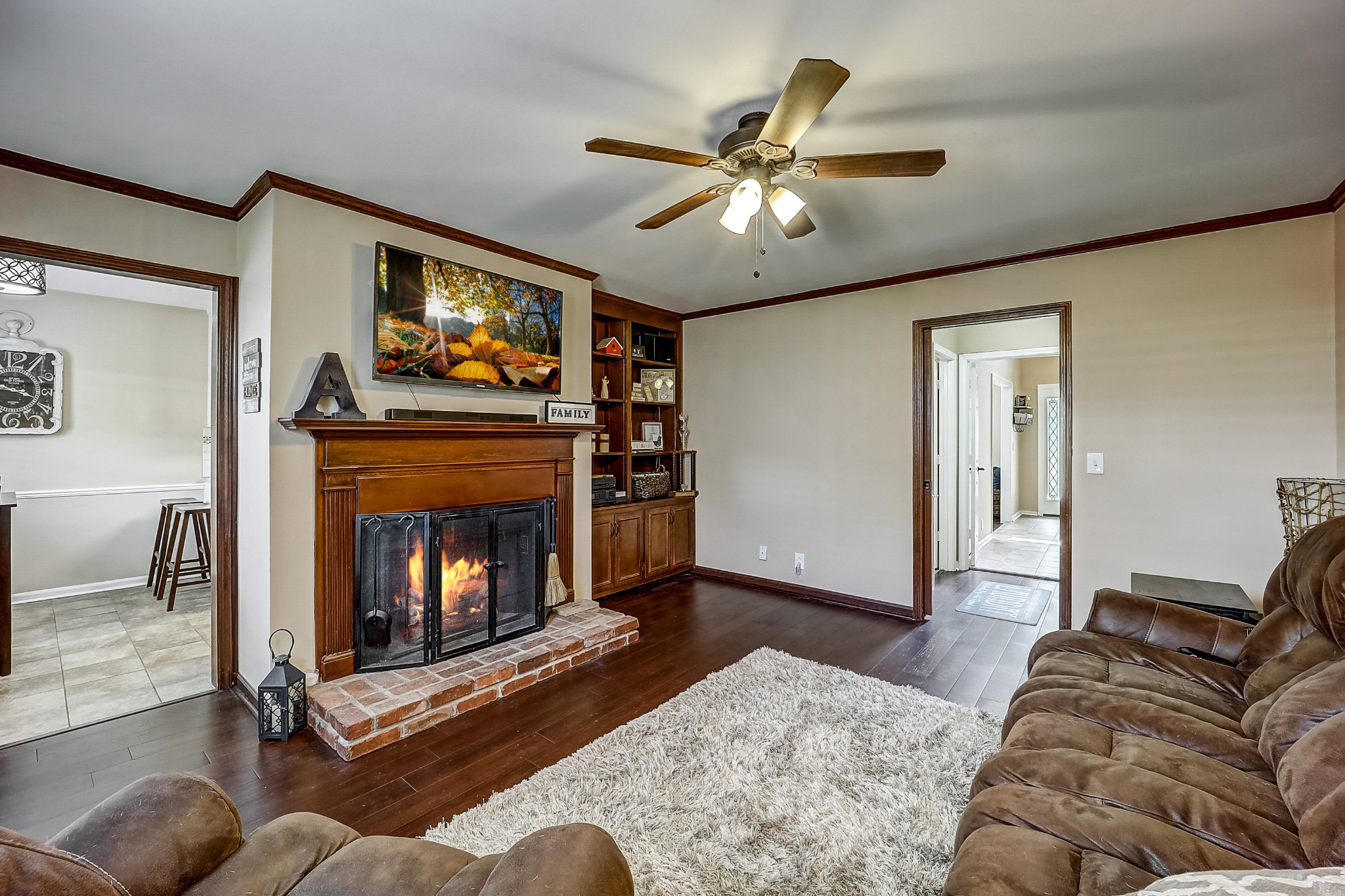 922 General George Patton Road Nashville, TN 37221 - Photo 5 of 30 a living room with furniture a flat screen tv and a fireplace