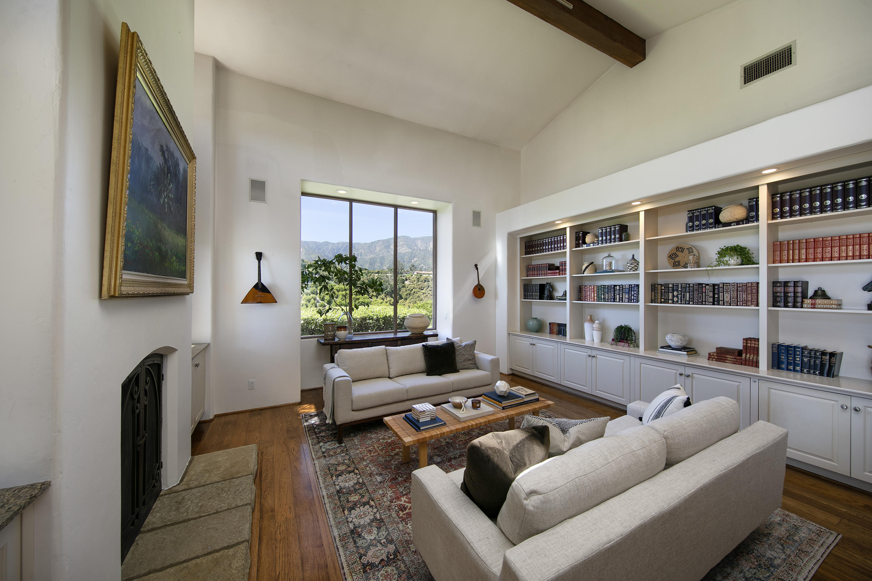 2250 Ortega Ranch Road Summerland, CA 93067 - Photo 15 of 28 a living room with furniture and a floor to ceiling window