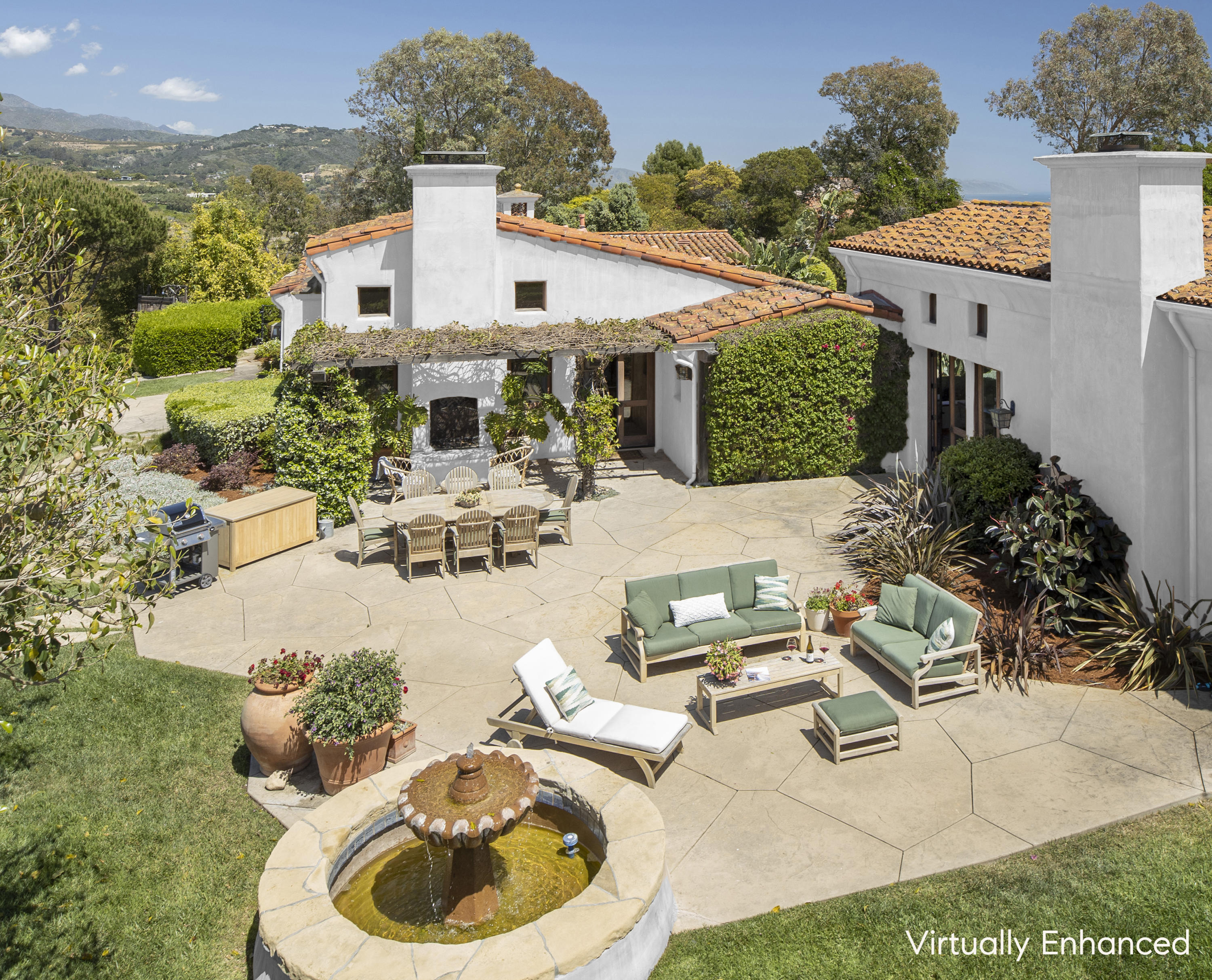 2250 Ortega Ranch Road Summerland, CA 93067 - Photo 4 of 28 a view of a patio with couches table and chairs and potted plants