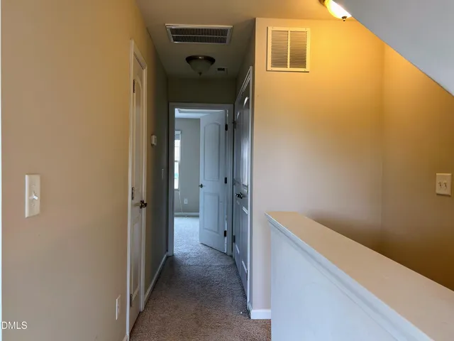 a bathroom with a double vanity sink a mirror and a shower