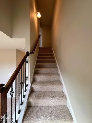 an empty room with an entryway door