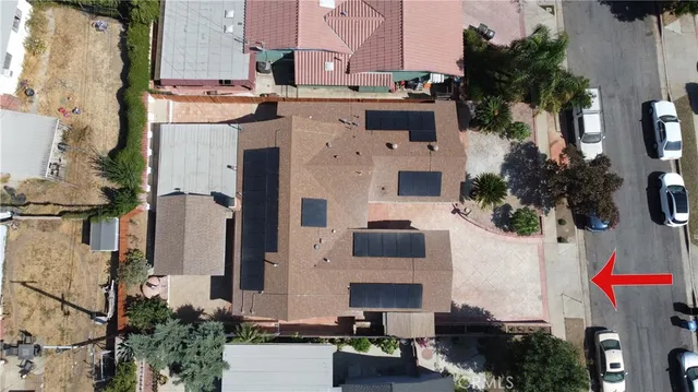 an aerial view of multiple house with outdoor space