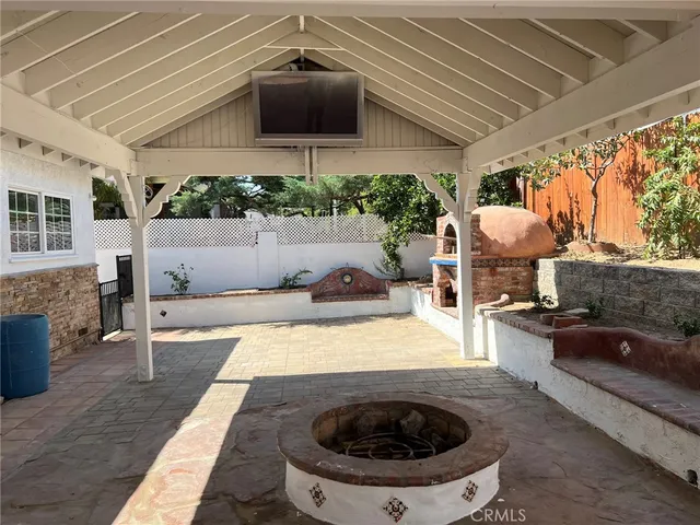 a view of a kitchen with a sink and a stove