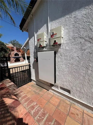 a view of a backyard with sitting area