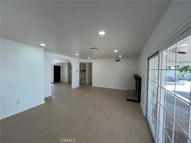 a view of a hallway with stairs