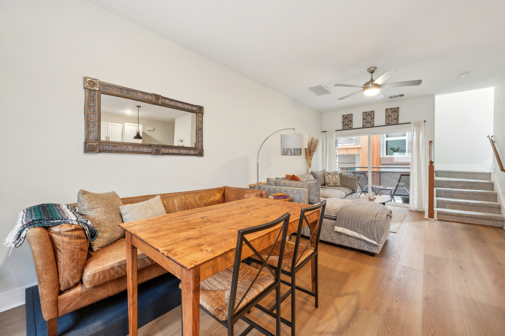 2827 Manor Road, Unit 3104 Austin, TX 78722 - Photo 6 of 30 Hardwood floors flow through this welcoming living area, featuring an open-concept layout.